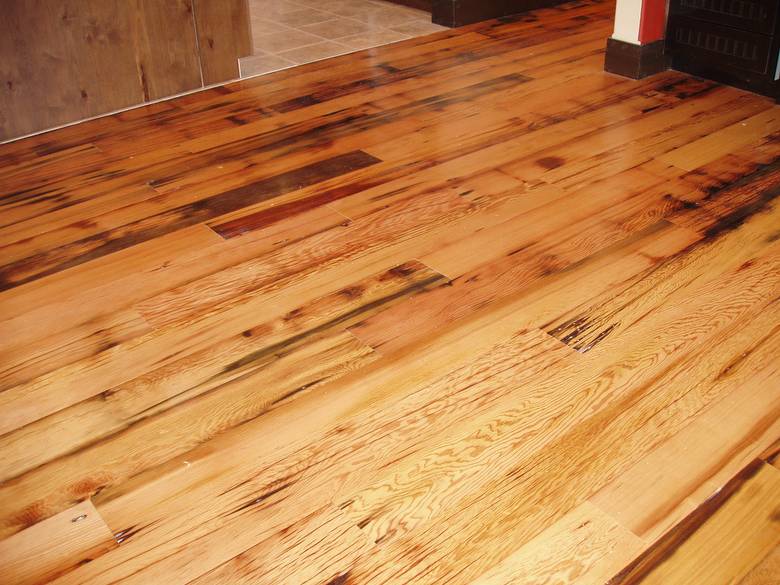 Picklewood Flooring (exterior of the stave) / Note the checking and staining that is characteristic of this floor